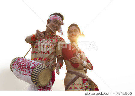 Bihu dancers standing back to back 7941900