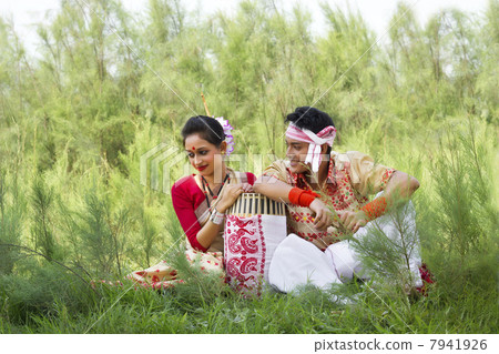 Bihu dancers sitting together 7941926