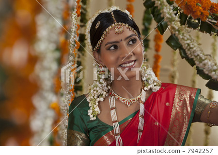 Beautiful Asian bride looking away Beautiful Asian bride looking away 7942257