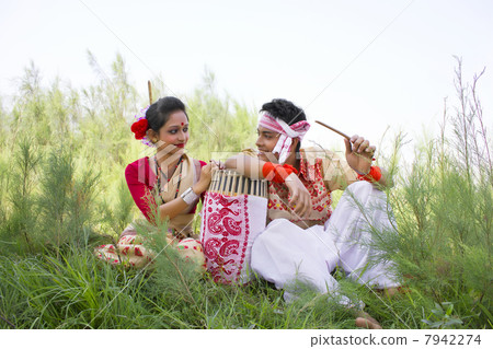 Bihu dancers sitting together Bihu dancers sitting together 7942274