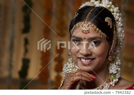 Portrait of traditional Indian woman smiling Portrait of traditional Indian woman smiling 7942382