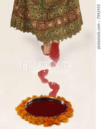 Low section of bride walking 7942435