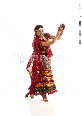 Female dandiya dancer dancing Female dandiya dancer dancing 7942477