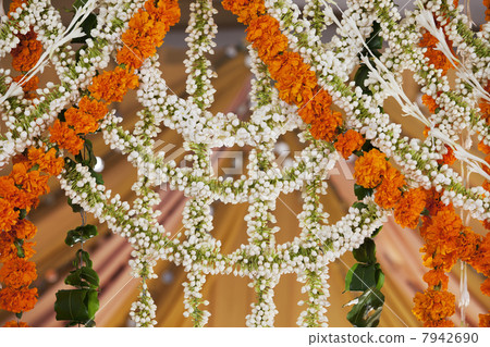 Close-up of flower garlands hanging Close-up of flower garlands hanging 7942690