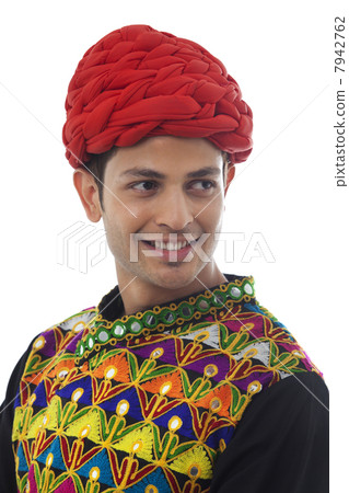 Portrait of a male dandiya dancer Portrait of a male dandiya dancer 7942762