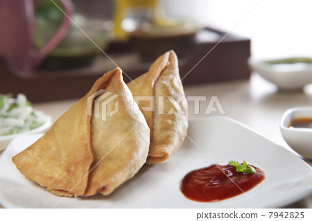 Samosas with tomato ketchup in plate 7942825