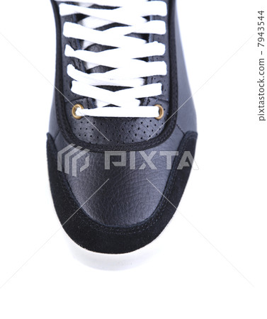 Sport shoe isolated. Close-up. Sport shoe isolated. Close-up. 7943544