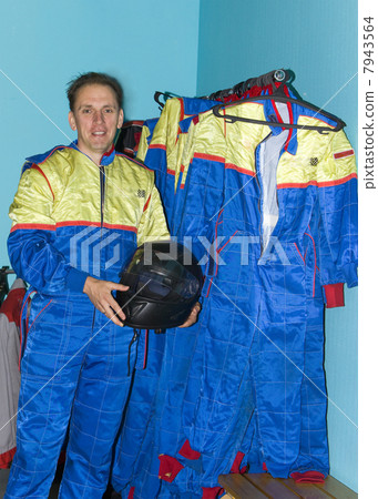 The man in racing overalls The man in racing overalls 7943564