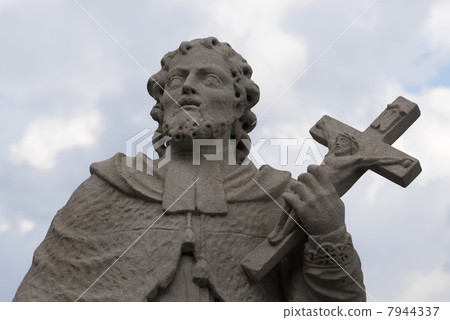 Statue of saint with cross Statue of saint with cross 7944337