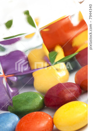Colorful candies are reflected in the glass Colorful candies are reflected in the glass 7944340