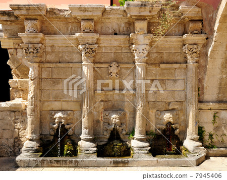 Old venetian fountain in city of Rethymno, Crete, Greece 7945406