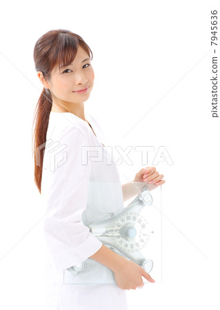 A woman with a scale A woman with a scale 7945636