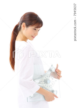 A woman with a scale A woman with a scale 7945637