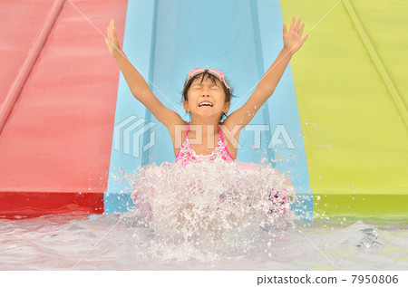 Girls playing in the pool 7950806