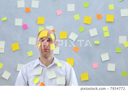 businessman with many notes businessman with many notes 7954772