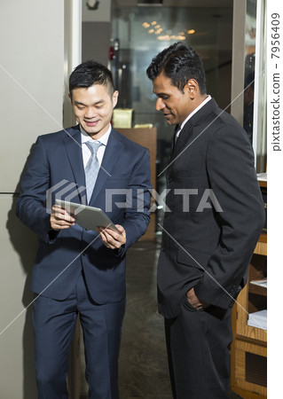 Two Asian Business men having a meeting. Two Asian Business men having a meeting. 7956409