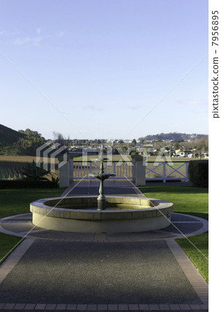 Dusk courtyard and fountain Dusk courtyard and fountain 7956895