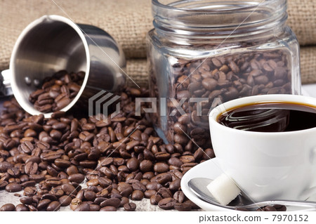 cup of coffee, pot and beans on sack 7970152
