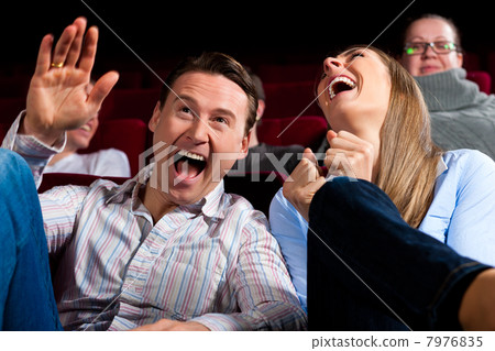 Couple and other people in cinema Couple and other people in cinema 7976835