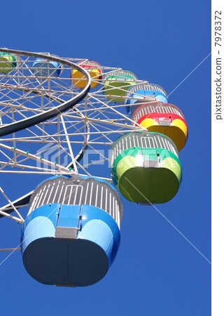 Colorful Ferris wheel and blue sky Colorful Ferris wheel and blue sky 7978372
