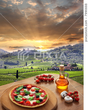 Italian pizza in Chianti, famous vineyard landscape in Italy Italian pizza in Chianti, famous vineyard landscape in Italy 7990888