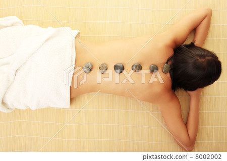 Attractive woman getting spa treatment Attractive woman getting spa treatment 8002002