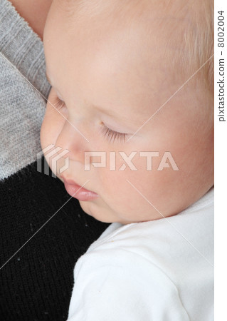 A mother and her tired cute baby boy A mother and her tired cute baby boy 8002004