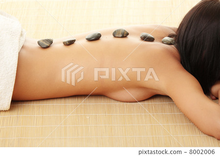 Attractive woman getting spa treatment 8002006