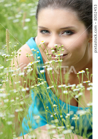 Beautiful young woman relaxing 8002453