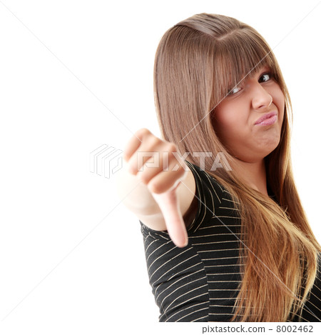 Young woman showing thumbs down 8002462
