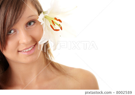 Teen girl relaxing in massage 8002589