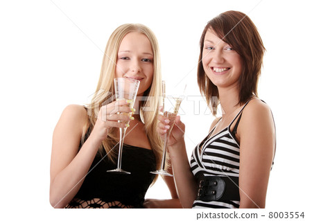 Two casual young women enjoying champagne 8003554