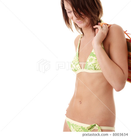 Beautiful young woman in swimwear 8003634