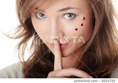 Young Woman Gesturing for Quiet or Shushing 8003788