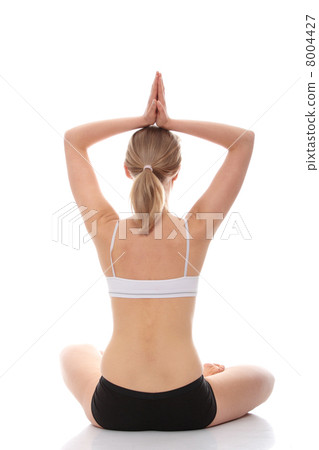 Young woman doing yoga exercise Young woman doing yoga exercise 8004427