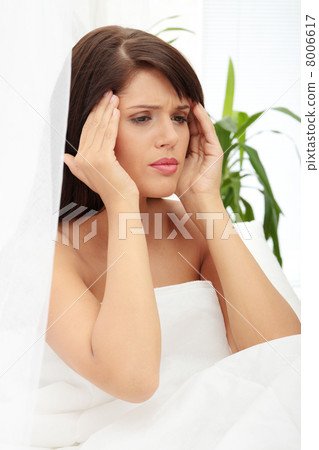 Woman with headache Woman with headache 8006617