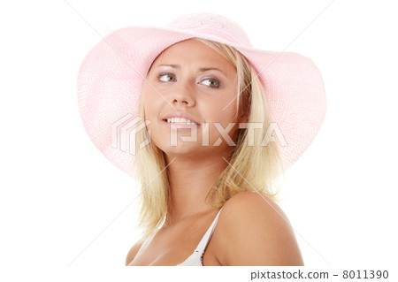 Young woman wearing a pink straw hat Young woman wearing a pink straw hat 8011390