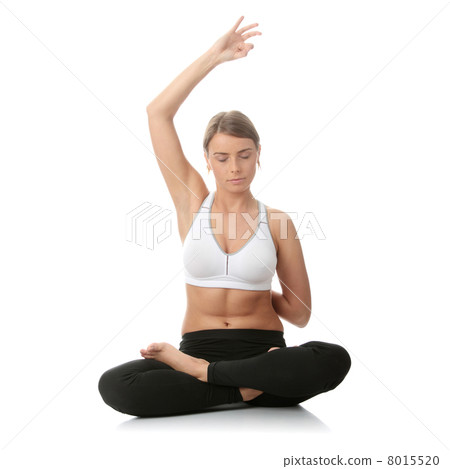 Beautiful young woman doing yoga exercise Beautiful young woman doing yoga exercise 8015520