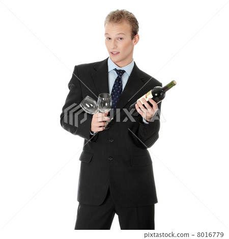 Young handsome business man with bottle of wine 8016779