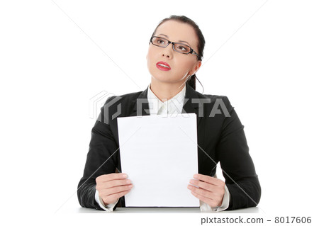 Young businesswoman behind the desk Young businesswoman behind the desk 8017606