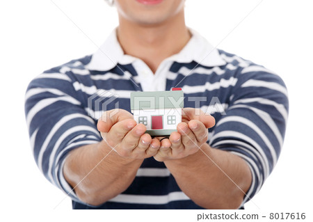 Young man with houses model. Young man with houses model. 8017616