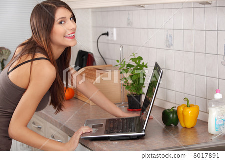 Young beautiful woman with laptop Young beautiful woman with laptop 8017891