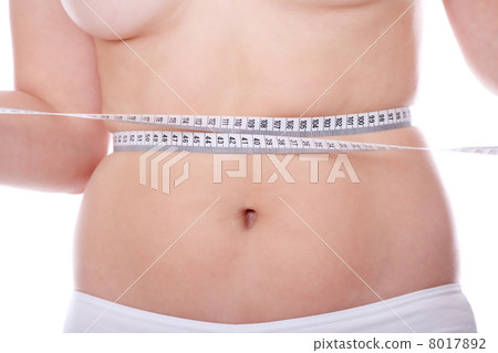 Female measuring her body Female measuring her body 8017892