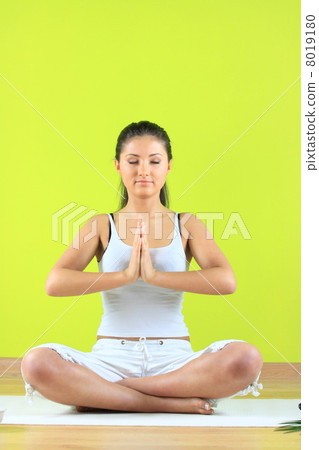 Young yoga female doing yogatic exericise Young yoga female doing yogatic exericise 8019180
