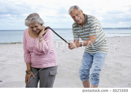 Old couple having fun 8025889