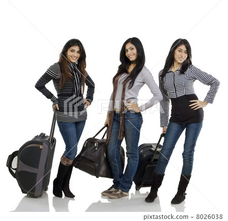 Girls posing with suitcases Girls posing with suitcases 8026038
