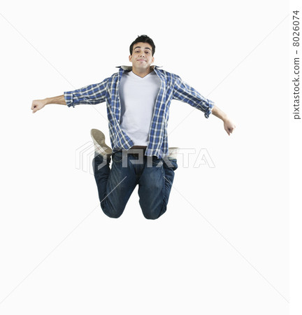 Man jumping in the air Man jumping in the air 8026074