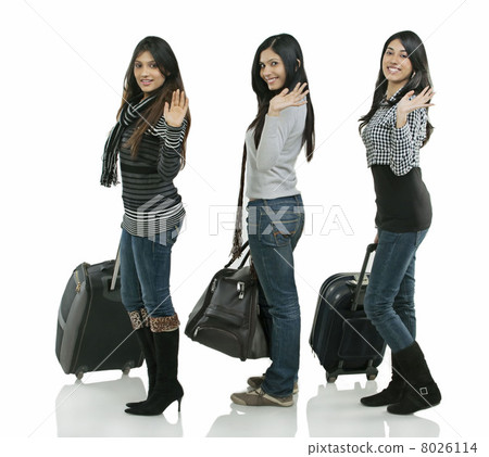 Girls posing with suitcases 8026114