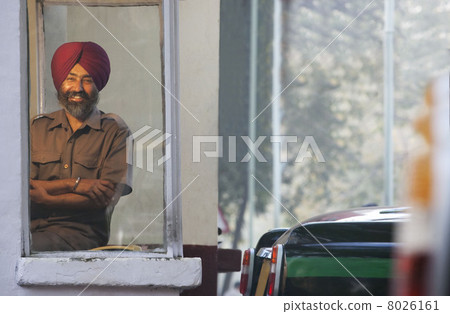 Portrait of a Sikh taxi driver at the taxi service Portrait of a Sikh taxi driver at the taxi service 8026161