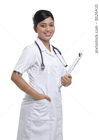 Portrait of a nurse with a clipboard 8026410